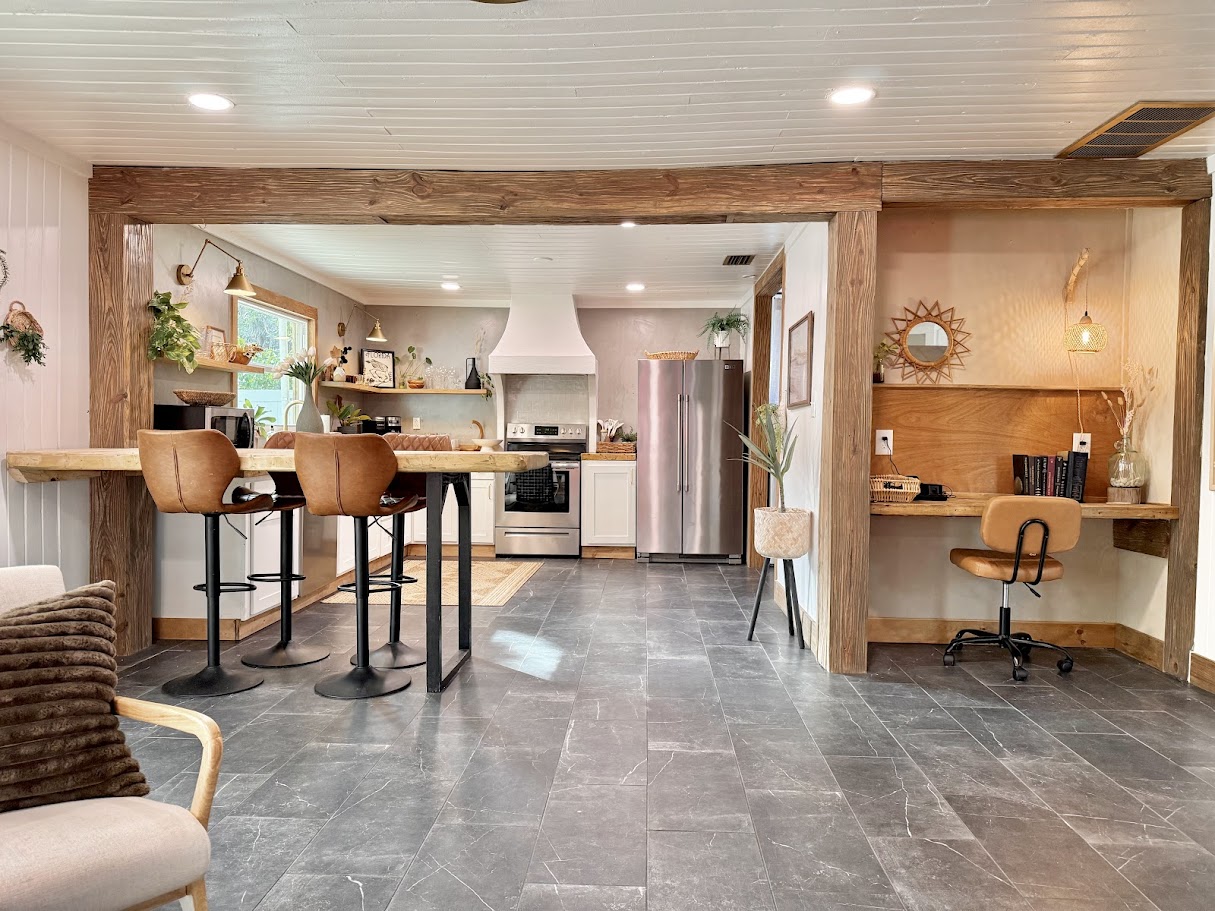 Kitchen after renovation by Madeira Studios — open kitchen with custom built-ins
